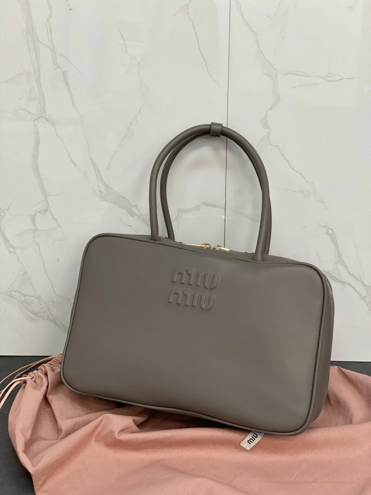 miumiu Original Leather Handheld Official Document Bag for Women 2025 New Large Capacity Retro Under