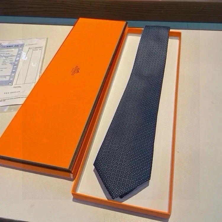 HE RMES Tie